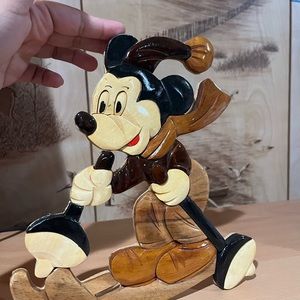 Mickey Mouse made out of wood skiing